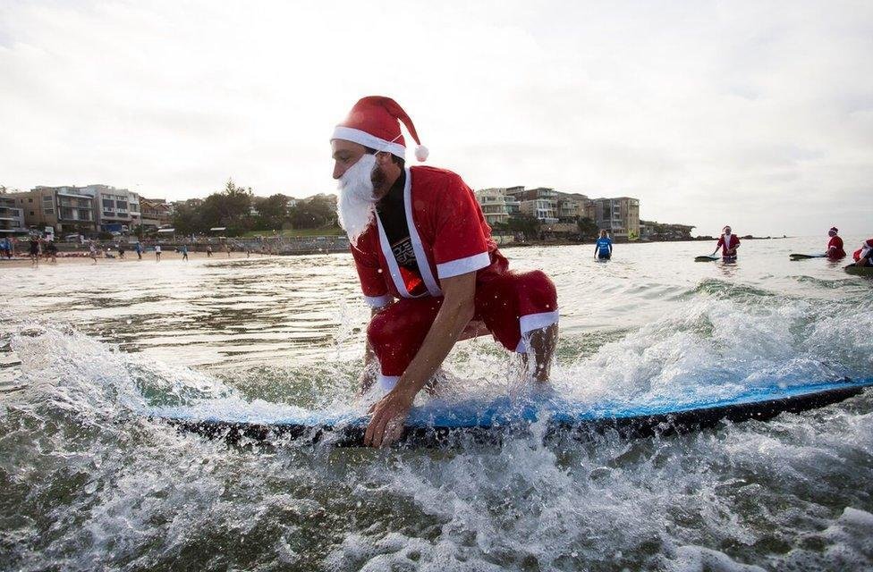 Surfing Santas: ‍Riding the ⁤Waves‌ of Holiday Cheer