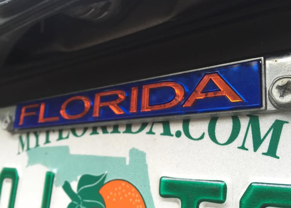 Your license plate frame could get you arrested and is most likely illegal now in the “free state of Florida.” A new Flo...