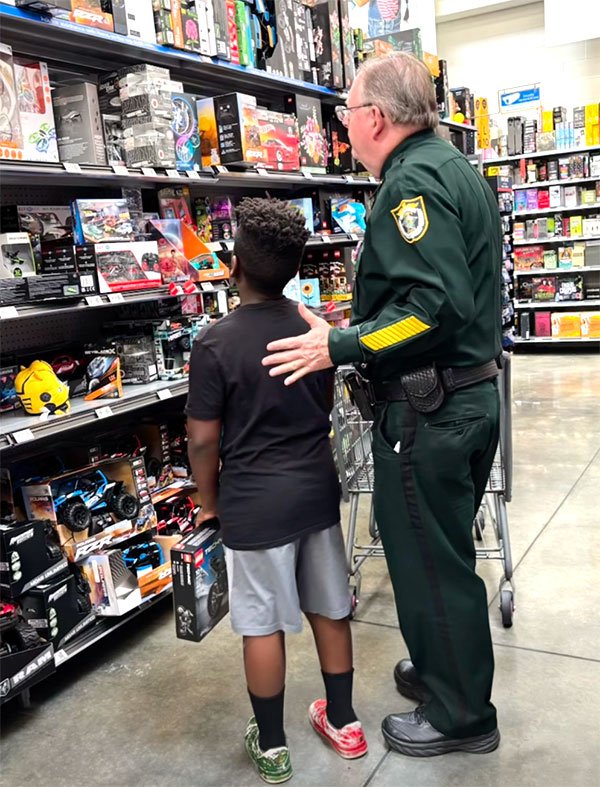 WATCH: Brevard Sheriff's Office Holds Annual 'Shop with a Cop' to Provide Christmas Gifts for Kids