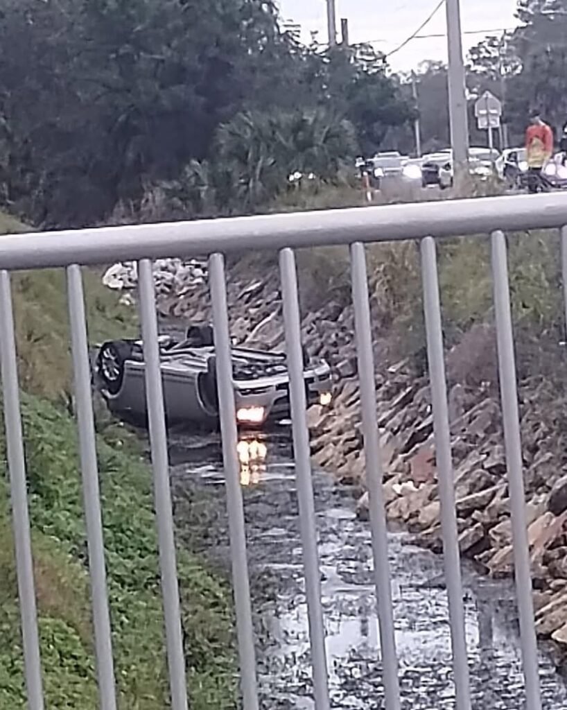 Car rollover into the ditch off Babcock and Malabar. 📸 Mike Ferra