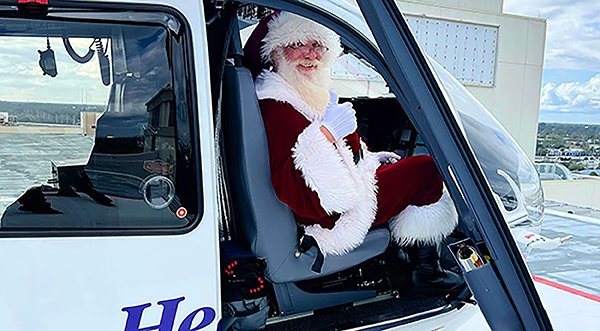 Santa Claus Takes to the Skies in Health First Helicopter for Holiday Gift Delivery