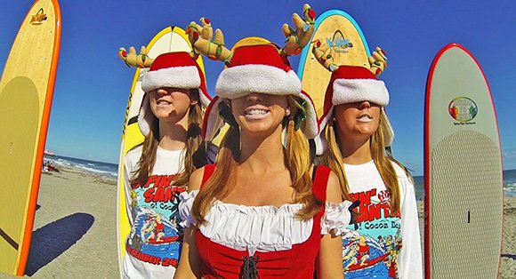 Cocoa Beach’s Famous Surfing Santas Set to Hit the Waves On Christmas Eve Morning
