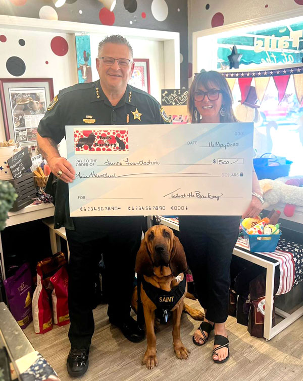 'Tails at The Barkery' in Cocoa Village Presents Check to Sheriff's Pet Posse in Junny's Honor