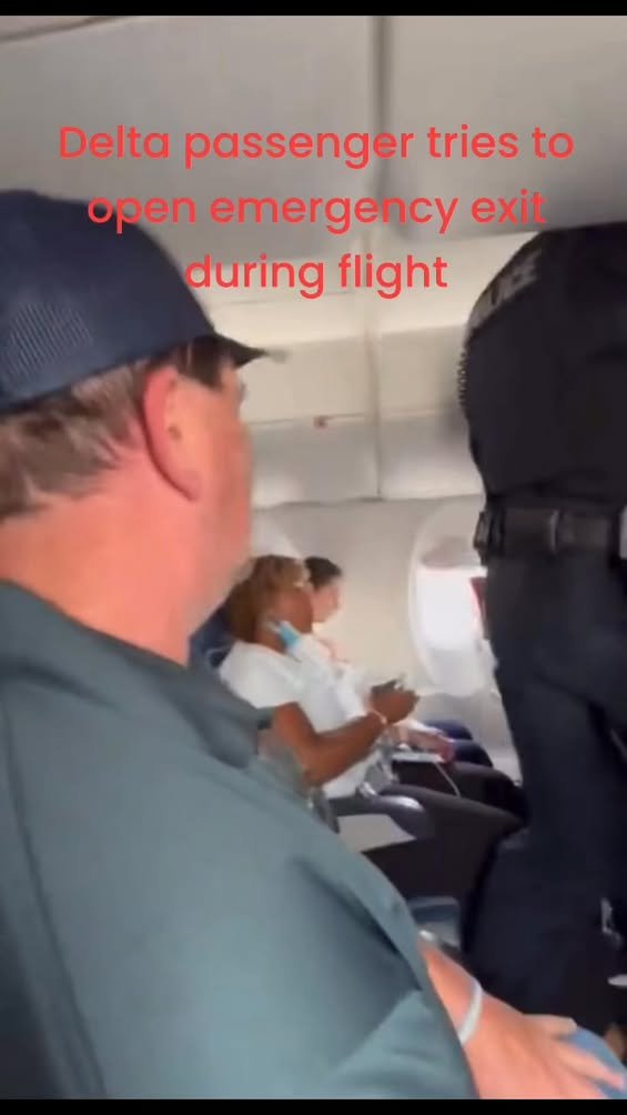 Delta regional flight was forced to land when a passenger reportedly tried to wrench open the emergency exit door and sq...