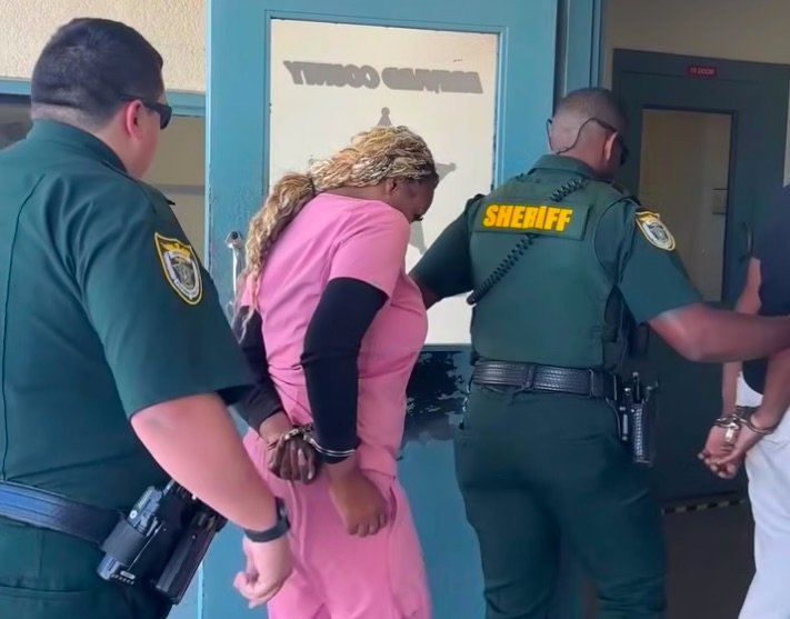 WATCH: Brevard Sheriff Walks Two Suspects Into Ivey's Iron Bar Lodge on Animal Cruelty Charges