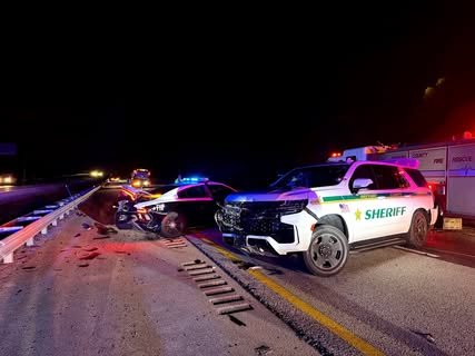 While working a crash on I-95 NB near MM 185, an FHP trooper and a Brevard County Sheriff deputy had their patrol vehicl...