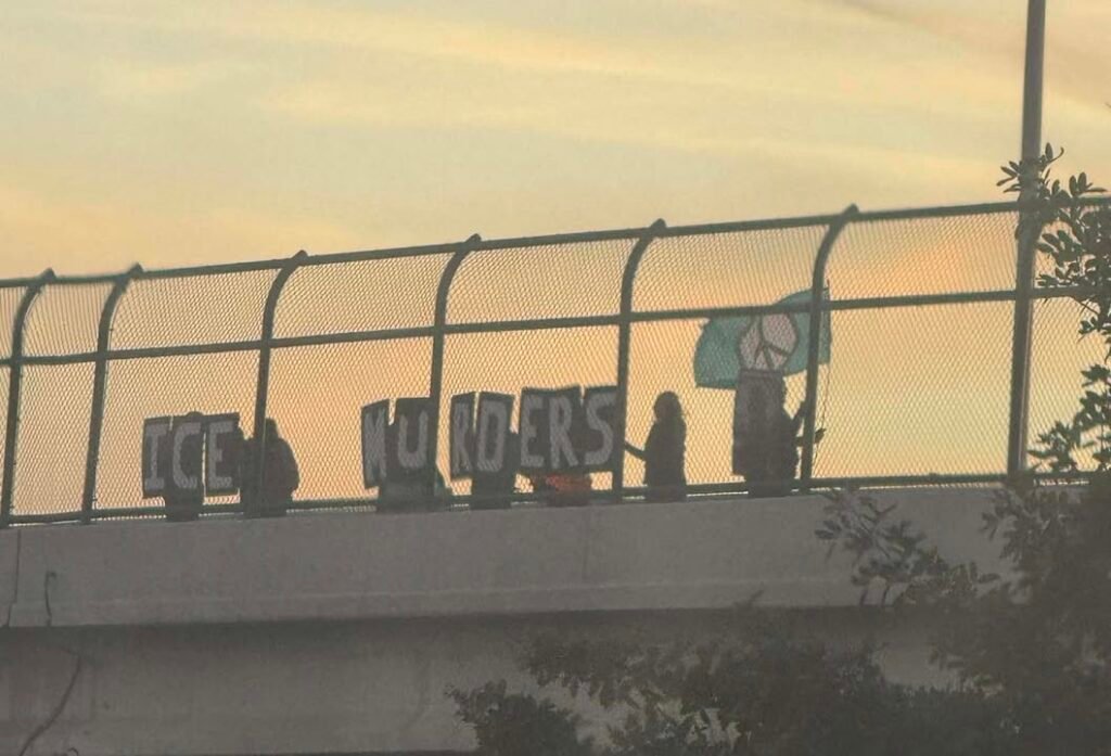 Peaceful anti ice protestors on overpass bridge on exit 195 (Rockledge/Viera)