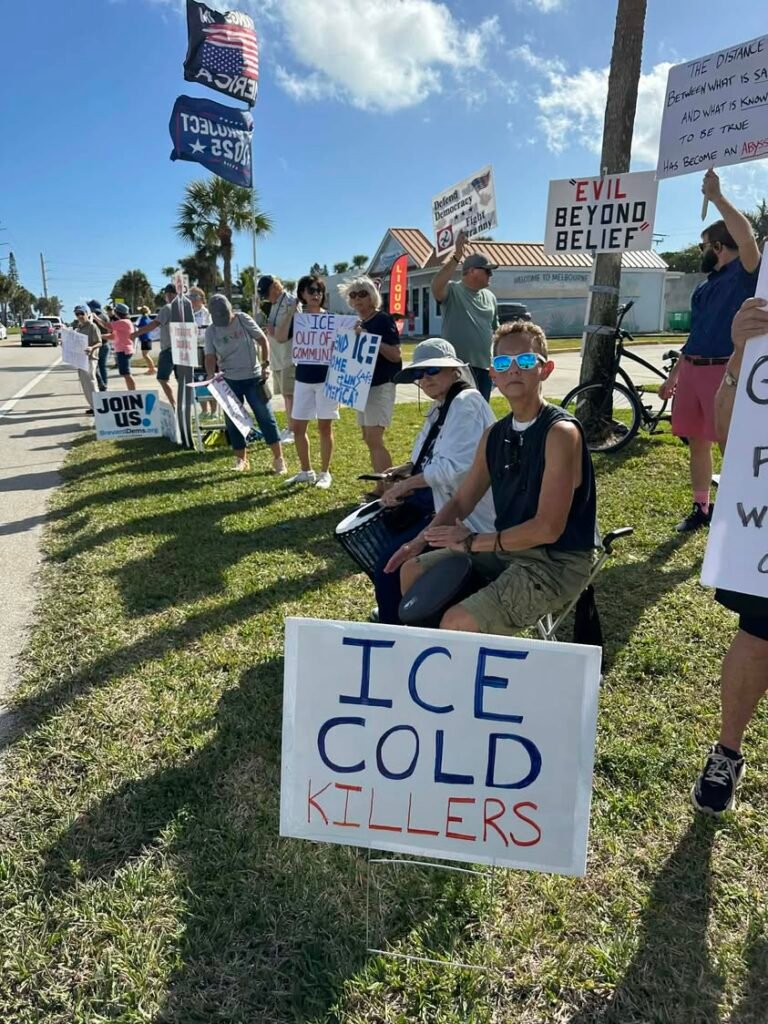 A group of about 100 protestors is rapidly growing in Melbourne Beach by the library. #ice #Borderpatrol