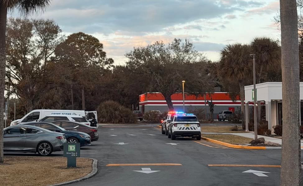 Bank robbery at TD on Babcock. Suspect is in custody.