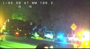 Major accident on 95 at mile marker 186 appearing to involve a car hauler that has lost multiple cars in the accident. E...