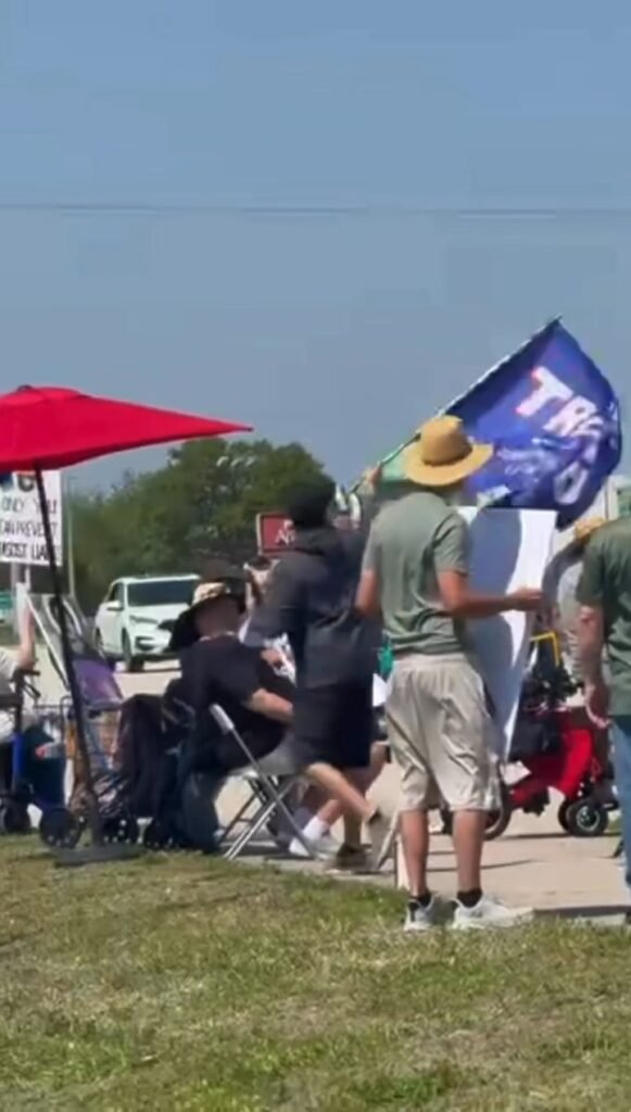 If you want to counter protest, don’t come and try like this guy to intentionally hit people in the face with your flag...