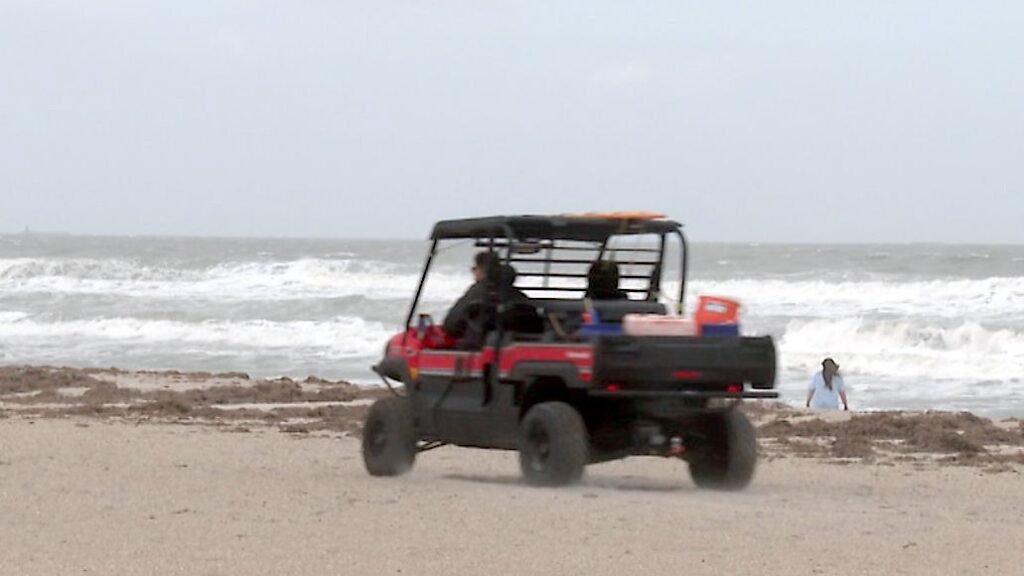 Cocoa Beach Fire and Ocean Rescue personnel monitor the beach Thursday as they prepare for dangerous rip currents expected in the area through the weekend. (Spectrum News)