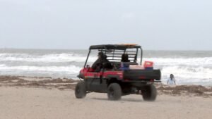 Cocoa Beach Fire and Ocean Rescue personnel monitor the beach Thursday as they prepare for dangerous rip currents expected in the area through the weekend. (Spectrum News)