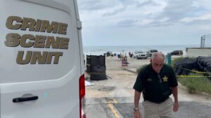 CASE UPDATE: The driver who ran over a Volusia County beach toll booth is in custody under Florida's Baker Act while the...